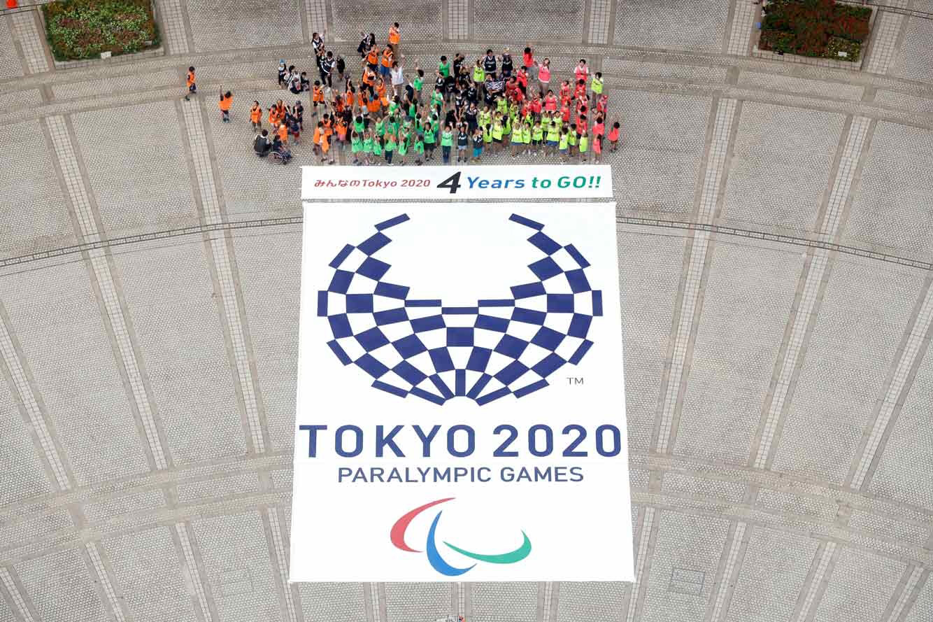 About a 100 children would rearrange the pieces of the Olympic logo to create the Paralympic emblem. 