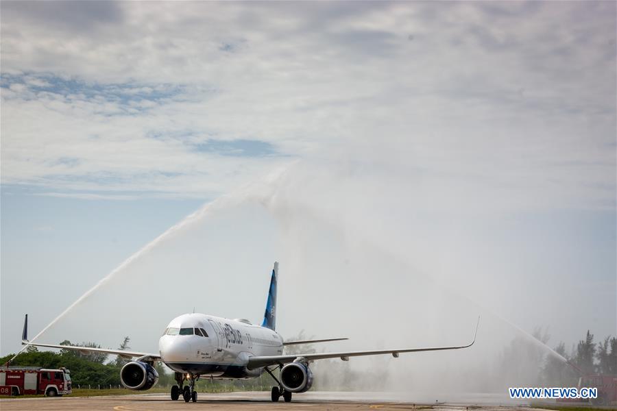  The first commercial flight from U.S. receives water salute at the Abel Santamaria International Airport in the central Cuban city of Santa Clara, Aug. 31, 2016. The first regular direct commercial flight from the United States arrived in the central Cuban city of Santa Clara on Wednesday morning, marking an important new step in thawing ties between the former Cold War foes. (Xinhua/Liu Bin)