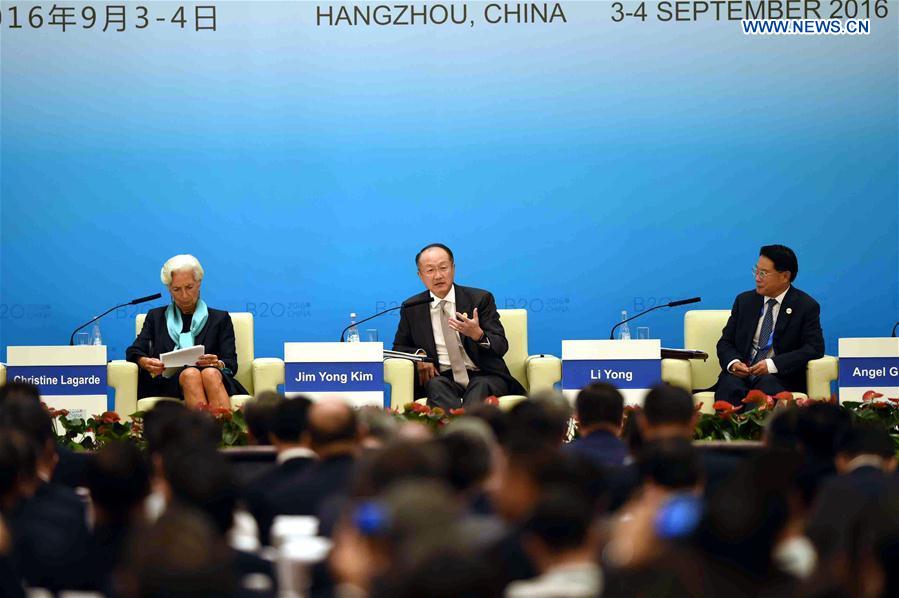 World Bank President Jim Yong Kim (C) speaks at the Business 20 (B20) summit in Hangzhou, capital of east China