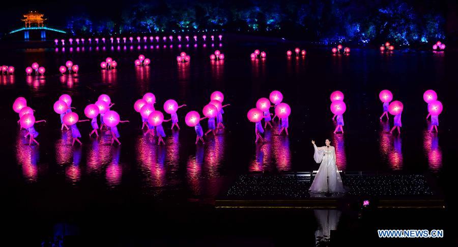 Artists perform during an evening gala for the G20 summit at the West Lake scenic zone in Hangzhou, capital of east China