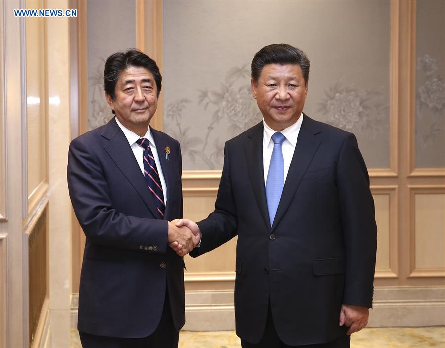 Chinese President Xi Jinping meets with Japanese Prime Minister Shinzo Abe, who is here to attend the Group of 20 (G20) summit, in Hangzhou, capital of east China