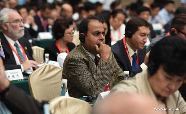 Photo taken on Sept.6, 2016 shows participants listening during the opening ceremony of Xi