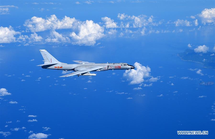 A Chinese Air Force H-6K bomber flies to the West Pacific, via the Bashi Strait, for a routine combat simulation drill, Sept. 12, 2016. The Chinese Air Force on Monday sent multiple aircraft models, including H-6K bombers, Su-30 fighters, and air tankers, for the drill. The fleet conducted reconnaissance and early warning, sea surface cruising, inflight refueling, and achieved all the drill