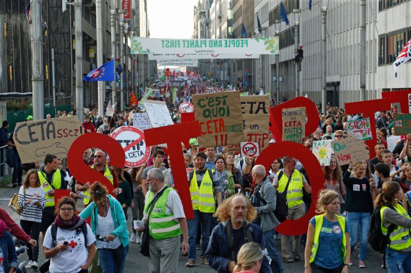 People take part in a demonstration against the Transatlantic Trade and Investment Partnership and CETA Comprehensive Economic and Trade Agreement on September 20, 2016, in Brussels.