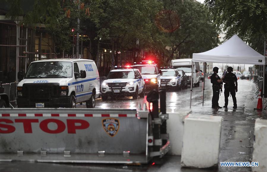 Police stand guard at a street near the United Nations headquarters in New York, the United States on Sept. 19, 2016. Security has been enforced in New York as a series of high level meetings are held at the UN Headquarters since Monday. (Xinhua/Wang Ying) 