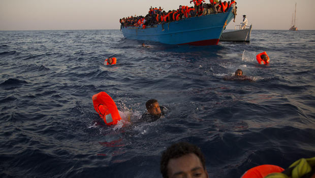 A boat carrying African migrants headed to Europe capsized off the Mediterranean coast near the Egyptian city of Alexandria on Wednesday, killing at least 42 people, Egyptian authorities said.