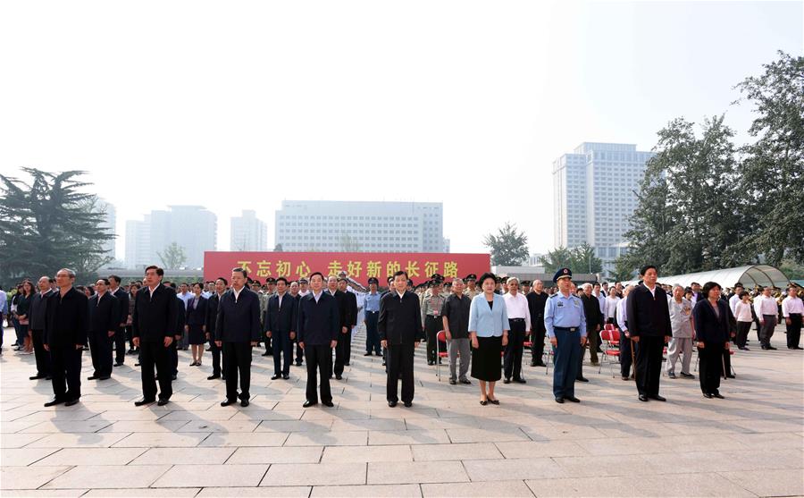 Liu Yunshan (C, front), a member of the Standing Committee of the Political Bureau of the Communist Party of China (CPC) Central Committee, attends the opening ceremony of the exhibition marking the 80th anniversary of the end of the Long March in Beijing, capital of China, Sept. 23, 2016. (Xinhua/Rao Aimin)