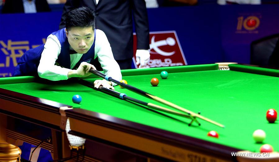 Ding Junhui of China plays a shot during a quarterfinal match against Michael Holt of England at the 2016 Shanghai Masters world snooker tournament in Shanghai, China, Sept. 23, 2016.