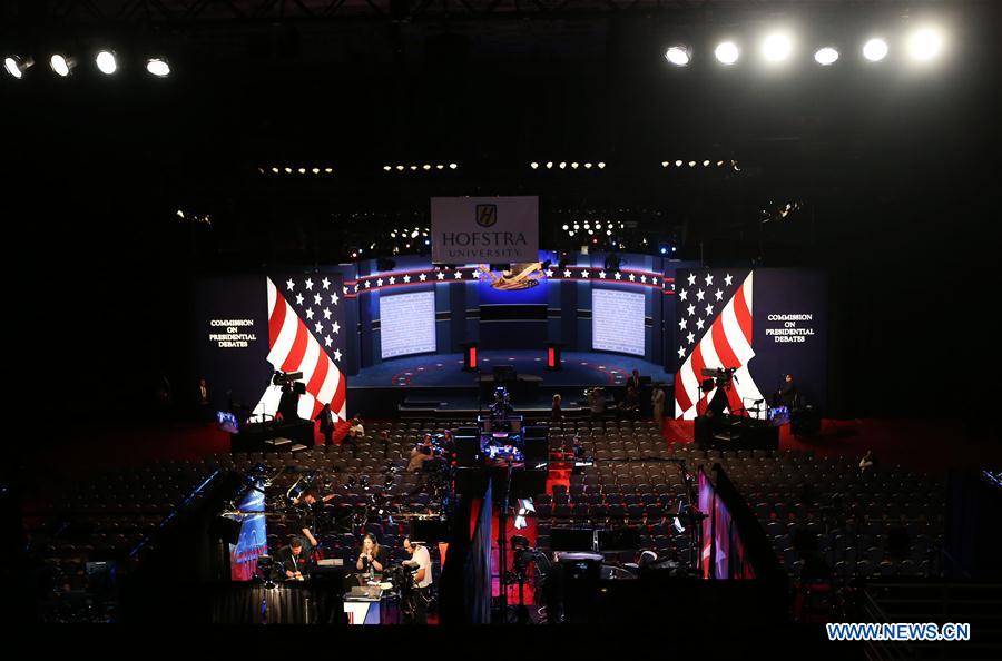 Photo taken on Sept. 26, 2016 shows the debate hall for the first U.S. presidential debate at Hofstra University in New York, the United States. The first of three presidential debates between the Democratic and Republican nominees, Hillary Clinton and Donald Trump, will be held Monday at Hofstra University in New York. (Xinhua/Qin Lang) 