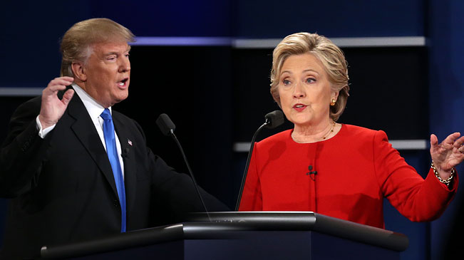 Democrat Hillary Clinton (R) and Republican Donald Trump attend their first presidential debate in Hempstead of New York, the United States, Sept. 26, 2016. Hillary Clinton and Donald Trump on Monday held their first presidential debate in Hempstead.