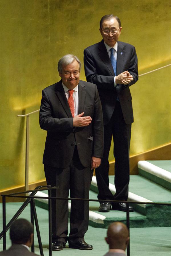 Antonio Guterres (front) gestures after he was appointed as the new UN Secretary-General at the UN headquarters in New York, Oct. 13, 2016. The United Nations General Assembly on Thursday appointed by acclamation Portuguese former Prime Minister Antonio Guterres as next UN secretary-general to succeed retiring Ban Ki-moon on Jan. 1, 2017. (Xinhua/Li Muzi)