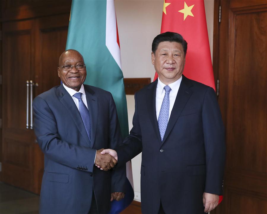 Chinese President Xi Jinping meets with South African President Jacob Zuma in the western Indian state of Goa, Oct. 15, 2016. (Xinhua/Lan Hongguang) 