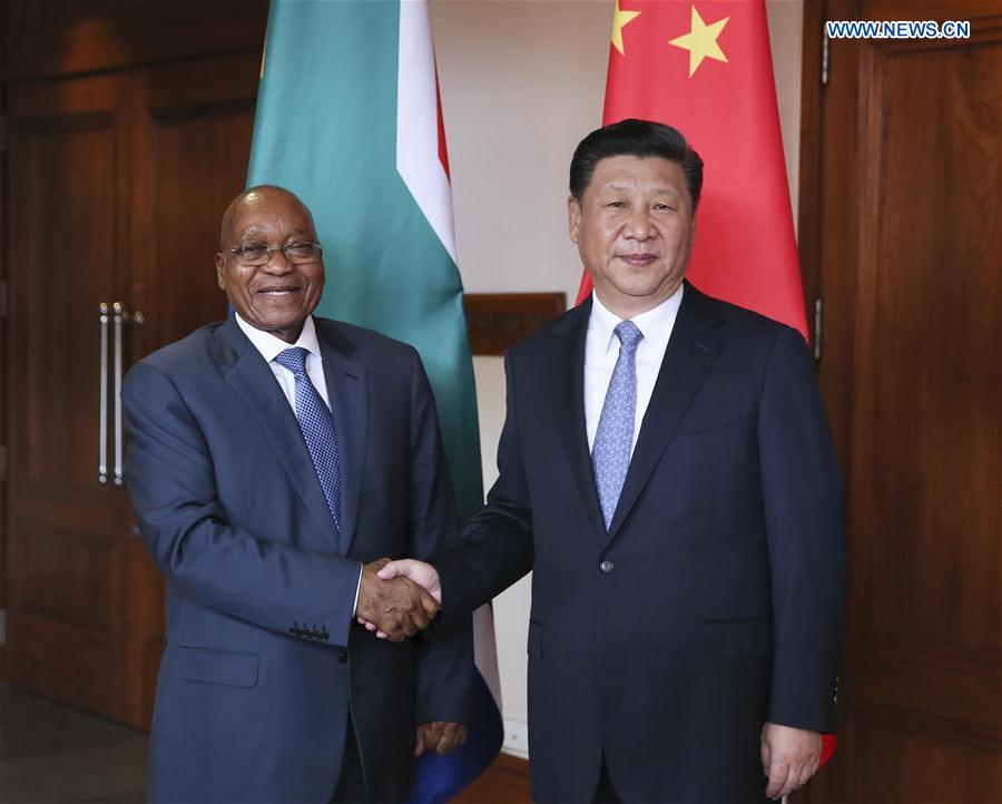 Chinese President Xi Jinping meets with South African President Jacob Zuma in the western Indian state of Goa, Oct. 15, 2016.