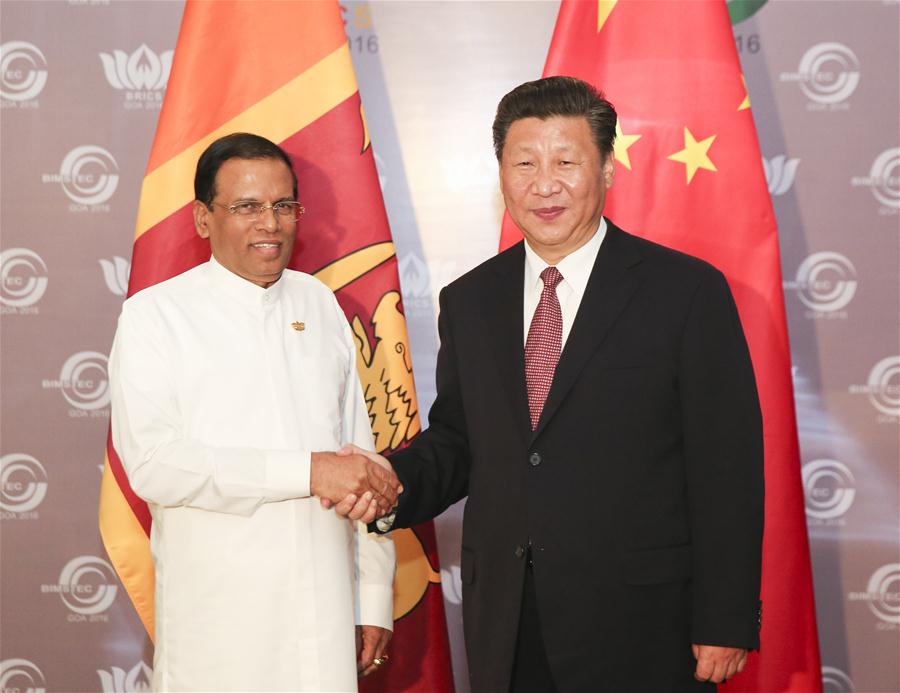 Chinese President Xi Jinping meets with Sri Lankan President Maithripala Sirisena in the western Indian state of Goa, Oct. 16, 2016. (Xinhua/Ding Lin)