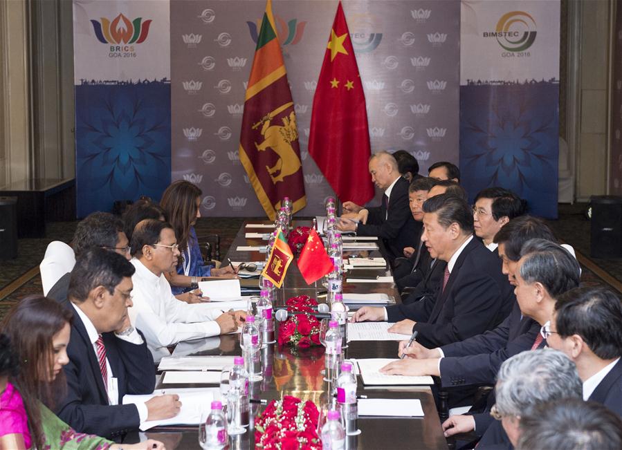 Chinese President Xi Jinping meets with Sri Lankan President Maithripala Sirisena in the western Indian state of Goa, Oct. 16, 2016. (Xinhua/Wang Ye)