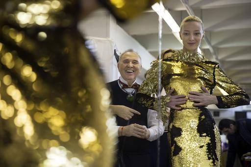 This gold dress will be deputed at Russian Fashion Week when he will unveil two new collections.