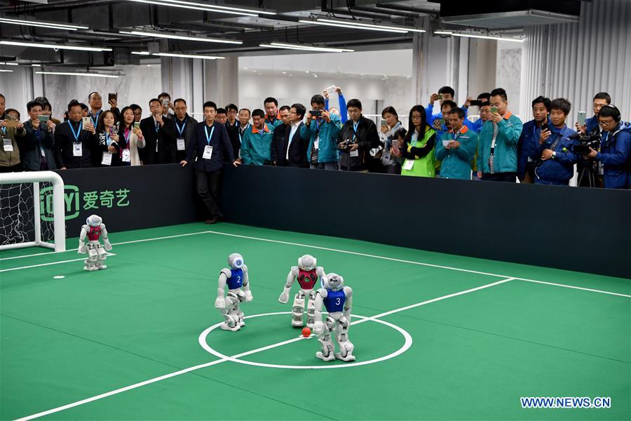  robots playing football during the 2016 World Robot Conference 