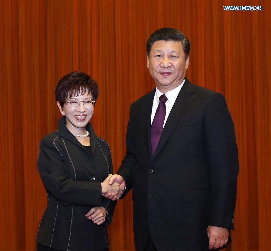 Xi Jinping (R), general secretary of the Communist Party of China Central Committee, meets with a delegation led by Hung Hsiu-chu, leader of Taiwan