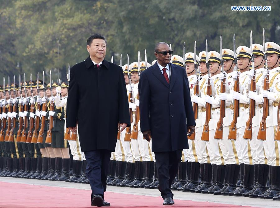 Chinese President Xi Jinping (L) holds a welcoming ceremony for visiting Guinean President Alpha Conde (R) before their talks in Beijing, capital of China, Nov. 2, 2016. (Xinhua/Ding Lin)