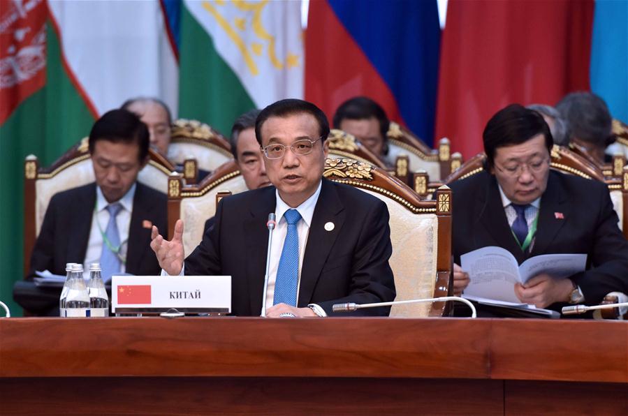 Chinese Premier Li Keqiang (C) attends the 15th Shanghai Cooperation Organization (SCO) prime ministers