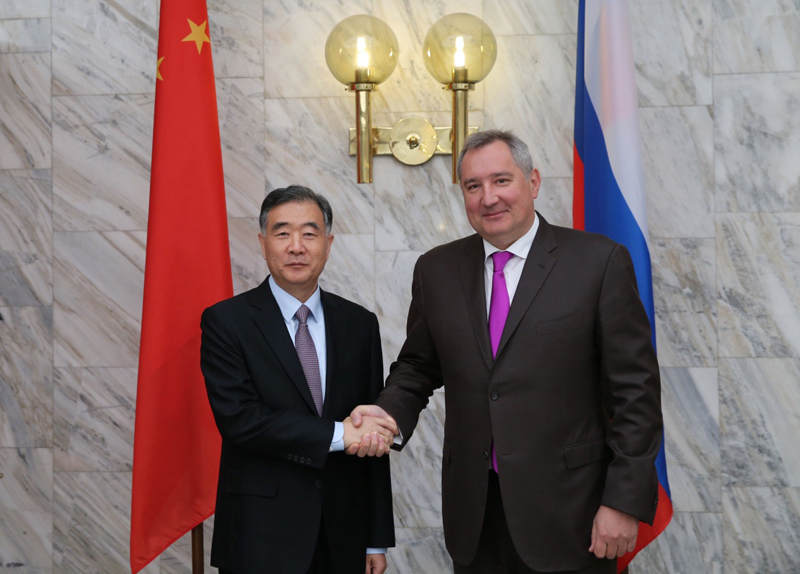 Chinese Vice Premier Wang Yang and Russian Deputy Prime Minster Dmitry Rogozin have met in Moscow. Both sides vowed to continue efforts to promote China-Russia relations.