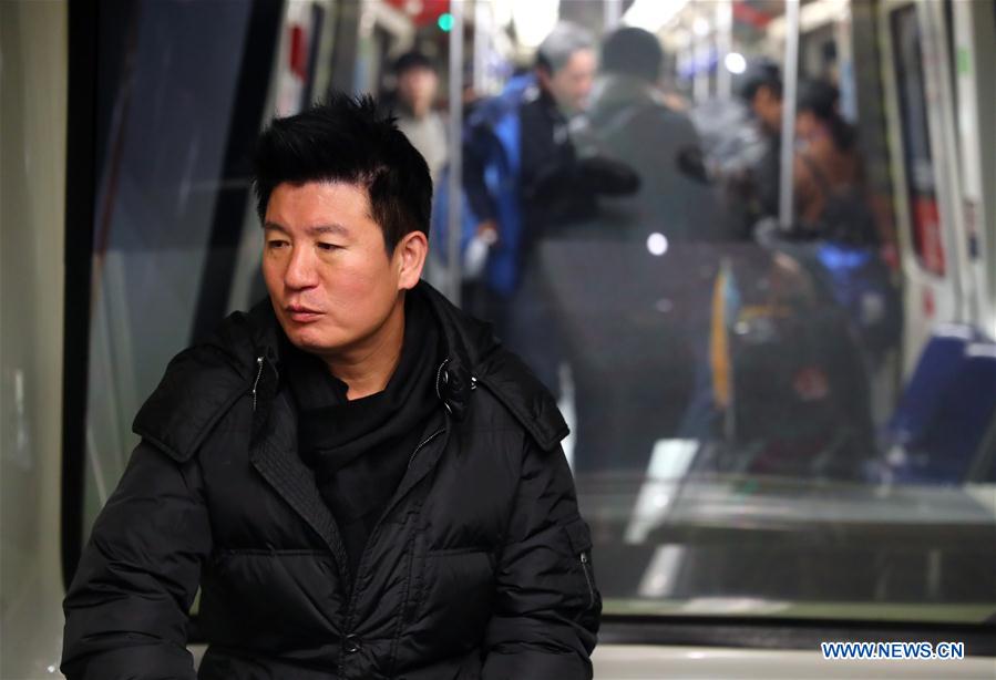 Yan Yongming, a graft fugitive who had been on the run for 15 years, arrives at Capital International Airport in Beijing, capital of China, Nov. 12, 2016. Yan returned to China Saturday to turn himself in. Yan, 47, who was the former chairman of the pharmaceutical company Tonghua Golden-horse in northeast China