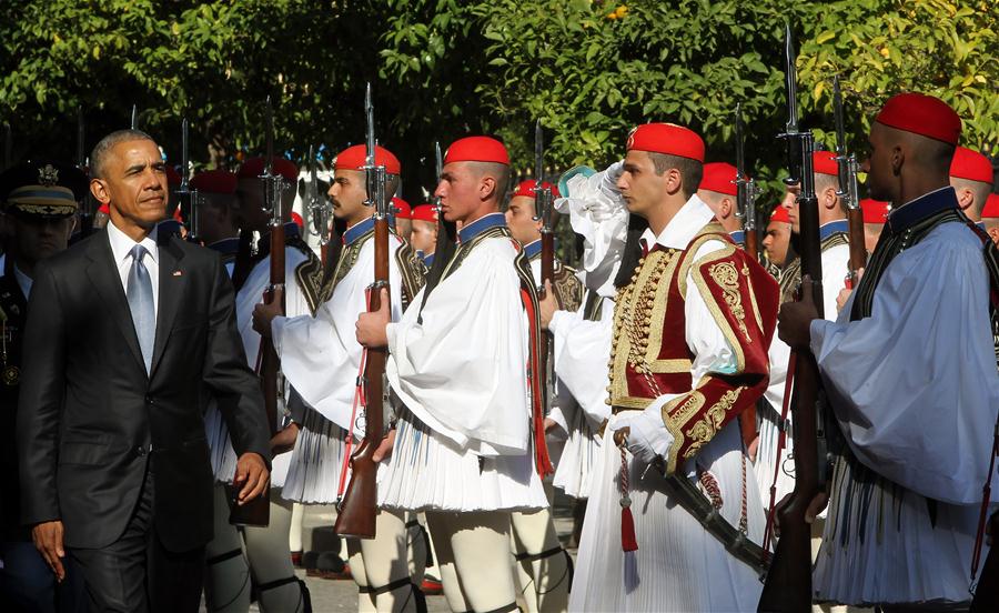 U.S. President Barack Obama (L) reviews a presidential honor guard during the official welcoming ceremony at the presidential palace in Athens, Greece, Nov. 15, 2016. U.S. President Barack Obama arrived in Athens Tuesday for a two-day visit amid draconian security measures as his trip marks the first to the country by a U.S. leader since 1999. (Xinhua/Marios Lolos)