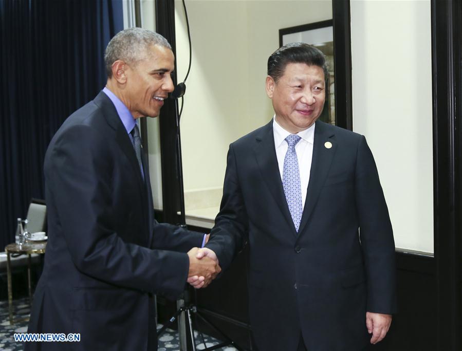 Chinese PresidentXi Jinping(R) meets with his U.S. counterpartBarack Obamain Lima, Peru, Nov. 19, 2016. (Xinhua/Lan Hongguang)