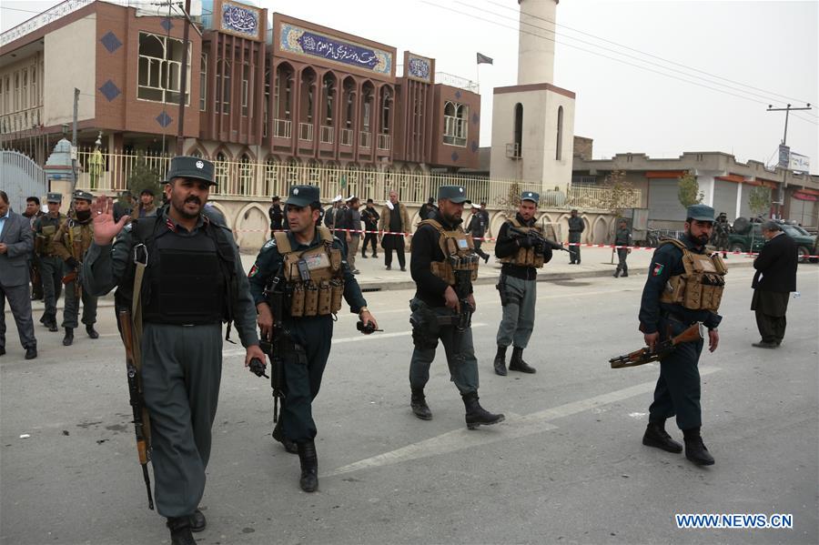 Afghan security force members walk near the site of a suicide attack in Kabul, capital of Afghanistan, Nov. 21, 2016. At least 27 people were killed and 35 others wounded after a suicide bombing ripped through a Shiite mosque in the western part of Kabul, capital of Afghanistan, on Monday, police said. (Xinhua/Rahmat Alizadah)