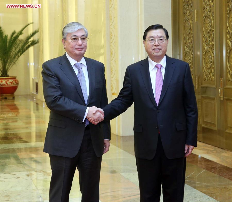 Zhang Dejiang (R), chairman of the Standing Committee of China
