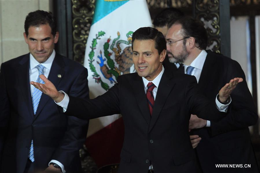Mexican President Enrique Pena Nieto speaks during a conference in Mexico City, Mexico, Jan. 11, 2017. U.S. president-elect Donald Trump on Wednesday infuriated Mexicans once again by repeating his pledge to build a wall along the border and have Mexico foot the bill. Mexican President Enrique Pena Nieto rejected Trump