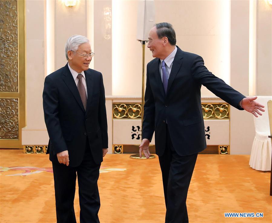 Wang Qishan (R), secretary of the Communist Party of China (CPC) Central Commission for Discipline Inspection, meets with Nguyen Phu Trong, General Secretary of the Communist Party of Vietnam Central Committee, in Beijing, capital of China, Jan. 13, 2017. (Xinhua/Liu Weibing)