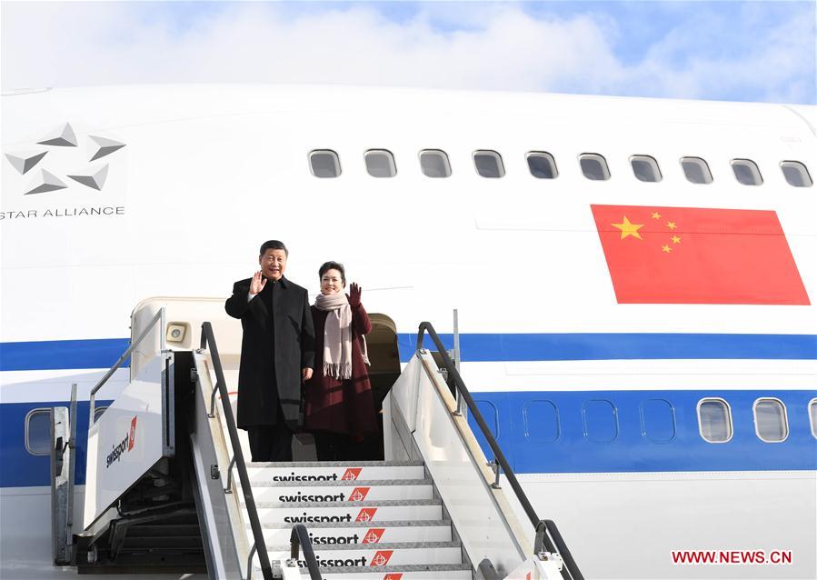 Chinese President Xi Jinping and his wife Peng Liyuan walk out of the plane after arrival in Zurich, Switzerland, Jan. 15, 2017. Chinese President Xi Jinping arrived here Sunday to pay a state visit to Switzerland and attend the 2017 annual meeting of the World Economic Forum (WEF) in Davos. (Xinhua/Rao Aimin)