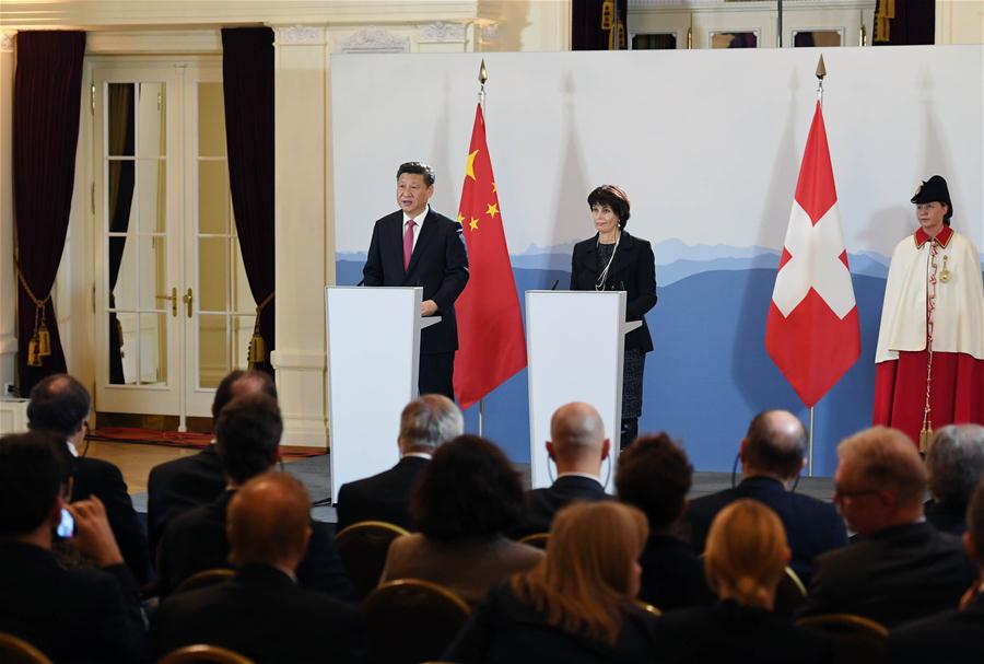 Chinese President Xi Jinping and his Swiss counterpart Doris Leuthard meet journalists after their talks in Bern, Switzerland, Jan. 16, 2017. (Xinhua/Rao Aimin)