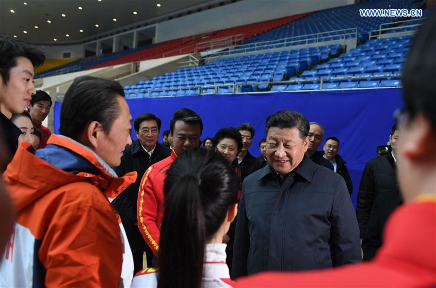 Chinese President Xi Jinping talks with coaches and athletes of China