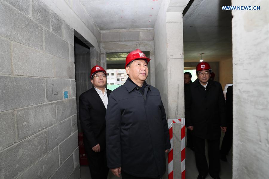 Chinese President Xi Jinping inspects the construction of resettlement housing for the new international airport in Beijing, capital of China, Feb. 23, 2017. Xi, also general secretary of the Communist Party of China Central Committee and chairman of the Central Military Commission, made an inspection tour in Beijing Thursday and Friday. (Xinhua/Lan Hongguang)