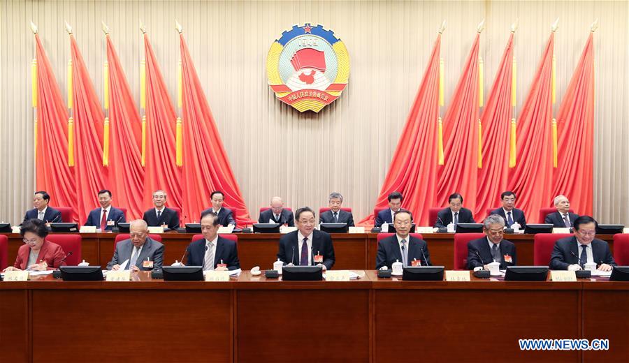 Yu Zhengsheng (C, front), chairman of the National Committee of the Chinese People
