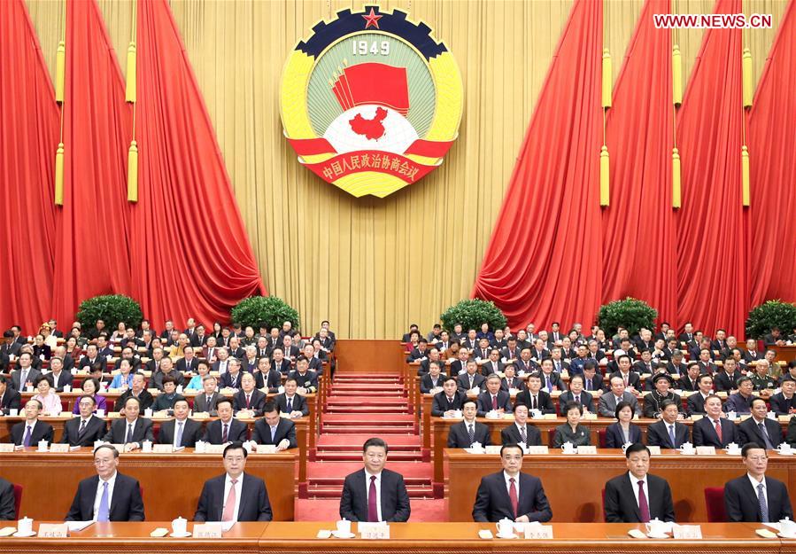 Xi Jinping (3rd L, front), Li Keqiang (3rd R, front), Zhang Dejiang (2nd L, front), Liu Yunshan (2nd R, front), Wang Qishan (1st L, front) and Zhang Gaoli (1st R, front) attend the opening meeting of the fifth session of the 12th National Committee of the Chinese People