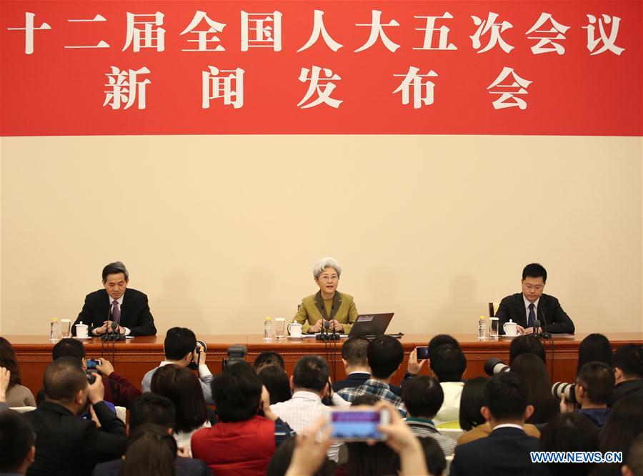Fu Ying (C, rear), spokesperson for the fifth session of China