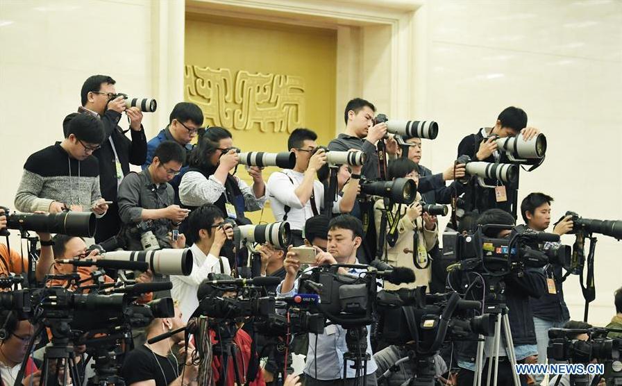 Journalists work at a press conference by Chinese Premier Li Keqiang at the Great Hall of the People in Beijing, capital of China, March 15, 2017. (Xinhua/Zhao Yingquan)