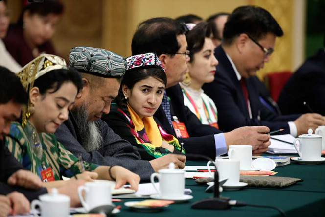 Rehangul Yimir at a panel discussion in Beijing on March 12, 2017, during the National People