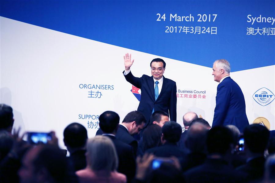 Chinese Premier Li Keqiang (L) and Australian Prime Minister Malcolm Turnbull attend the China-Australia Cooperation on Economy and Trade Forum in Sydney, Australia, March 24, 2017. (Xinhua/Yao Dawei)