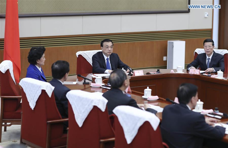 Chinese Premier Li Keqiang (C) presides over the 7th plenary meeting of the State Council in Beijing, capital of China, March 31, 2017. The State Council decided at the meeting to appoint Lam Cheng Yuet-ngor the fifth-term chief executive of Hong Kong Special Administrative Region. Lam will assume office on July 1, 2017. (Xinhua/Ding Lin) 