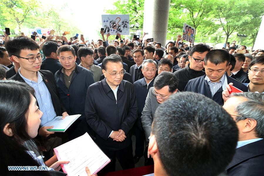 Chinese Premier Li Keqiang inspects Shandong University in Jinan, capital of east China