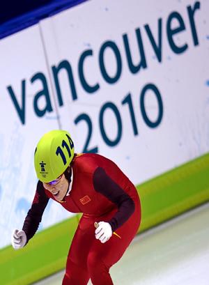 China's Zhou Yang celebrates after winning the women's 1500m final of short track speed skating at the 2010 Winter Olympic Games in Vancouver, Canada, Feb. 20, 2010. Zhou Yang won the gold medal.(Xinhua/Chen Xiaowei)