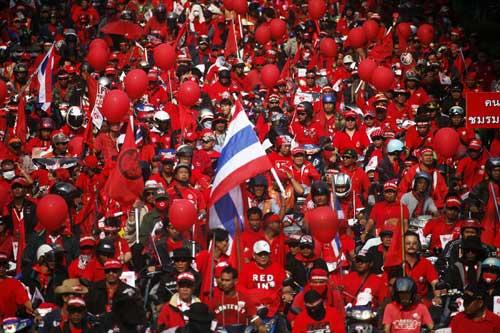 Thousands of anti-government protesters gather by their motorcycles before marching through central Bangkok March 20, 2010. (Xinhua/Reuters Photo)