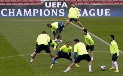 Barcelona's players take part in a training session at Camp Nou stadium in Barcelona, on March 16, on the eve of their 2nd leg round of 16 UEFA Champions League match against VfB Stuttgart.(AFP/Josep Lago) 