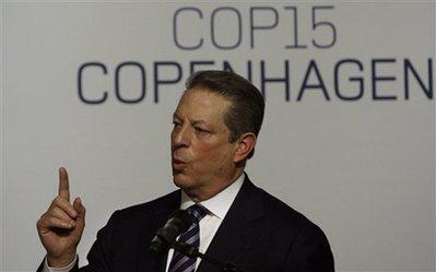 Former U.S. Vice President Al Gore gestures as he joins cabinet ministers from Nordic countries for discussion on Greenland's ice sheet at the UN Climate summit in Copenhagen, Denmark, Monday, Dec. 14, 2009. With a week for the climate summit to end, the split between the developing and developed world became sharper as ministers of the world's nations started to arrive for a crucial second week of climate talks.(AP Photo/Anja Niedringhaus)