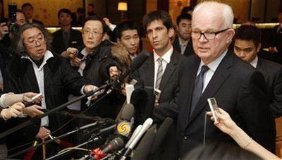 U.S. special envoy to North Korea Stephen Bosworth, right, speaks to reporters at a hotel in Beijing, Wednesday, Feb. 24, 2010. (AP Photo/Vincent Thian)