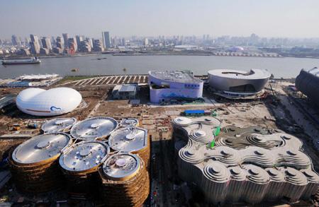 The Expo site is seen in this picture taken on December 16, 2009, in Shanghai. With only 100 days to go before the 2010 Shanghai World Expo opens, most pavilions at the Expo site have been completed or are nearly finished. [Photo/Xinhua]